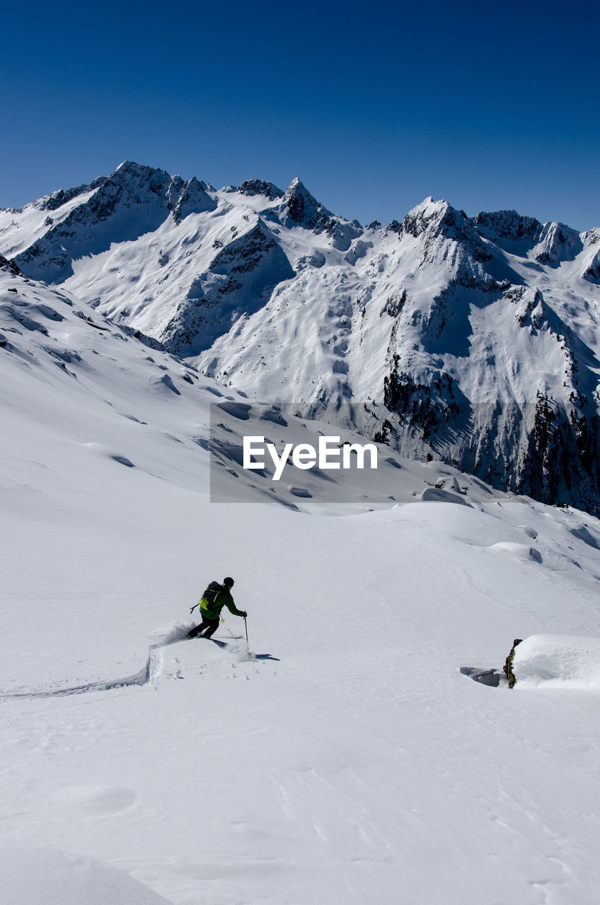 High angle view of person skiing on snow landscape