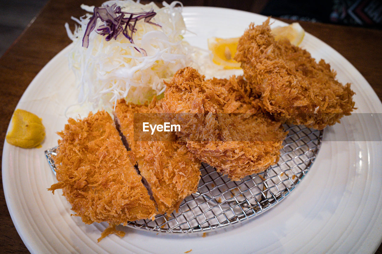 food, food and drink, tonkatsu, fried food, plate, meat, dish, meal, freshness, panko, cuisine, fish, fast food, no people, table, asian food, fried, crispy fried chicken, indoors, high angle view, close-up, healthy eating, serving size, fried chicken, wellbeing, still life