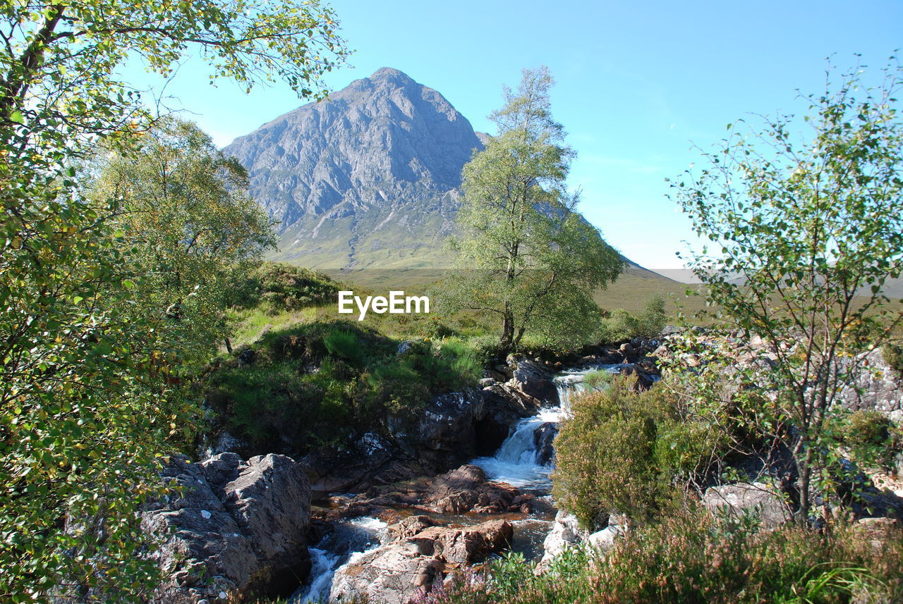 Scenic view of mountains against clear sky