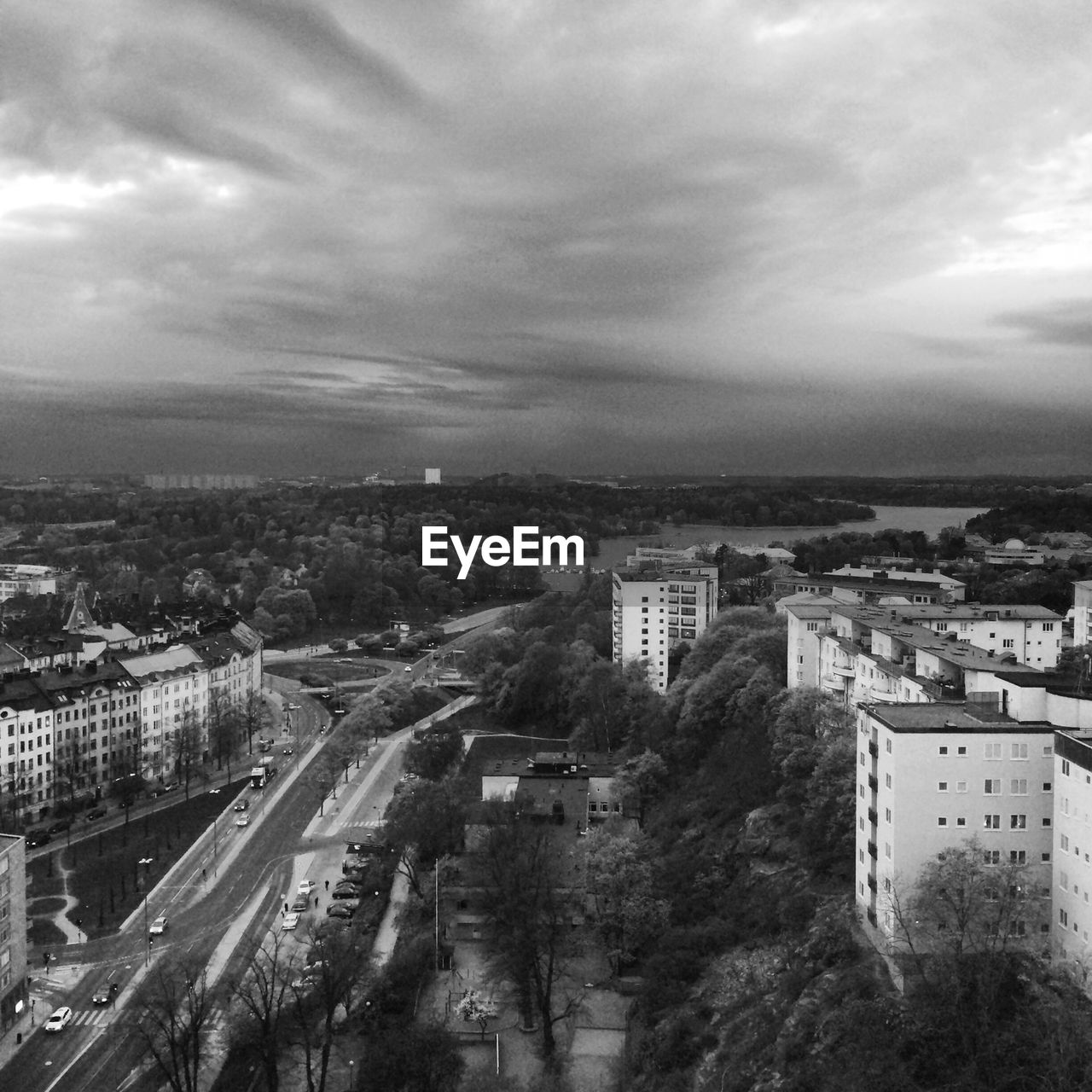 CITYSCAPE AGAINST CLOUDY SKY