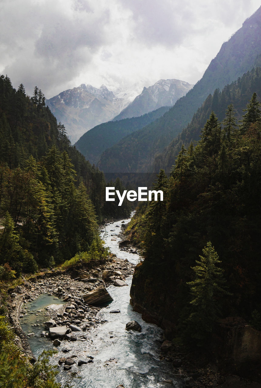 Scenic view of river and mountains