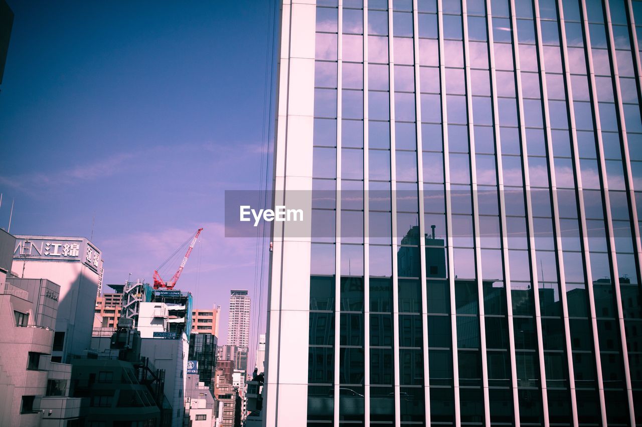 Low angle view of skyscrapers against sky