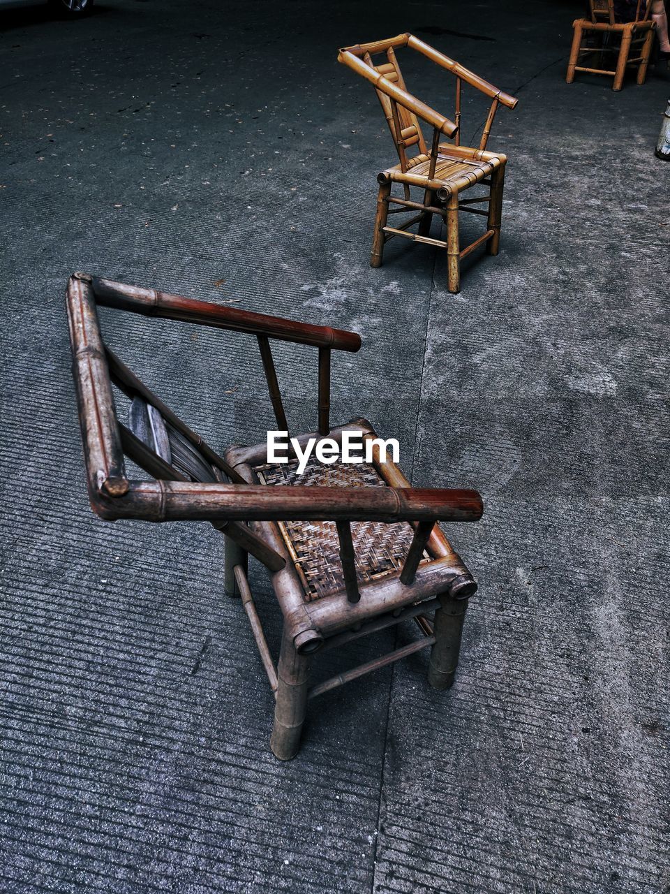 HIGH ANGLE VIEW OF EMPTY CHAIRS AND TABLES