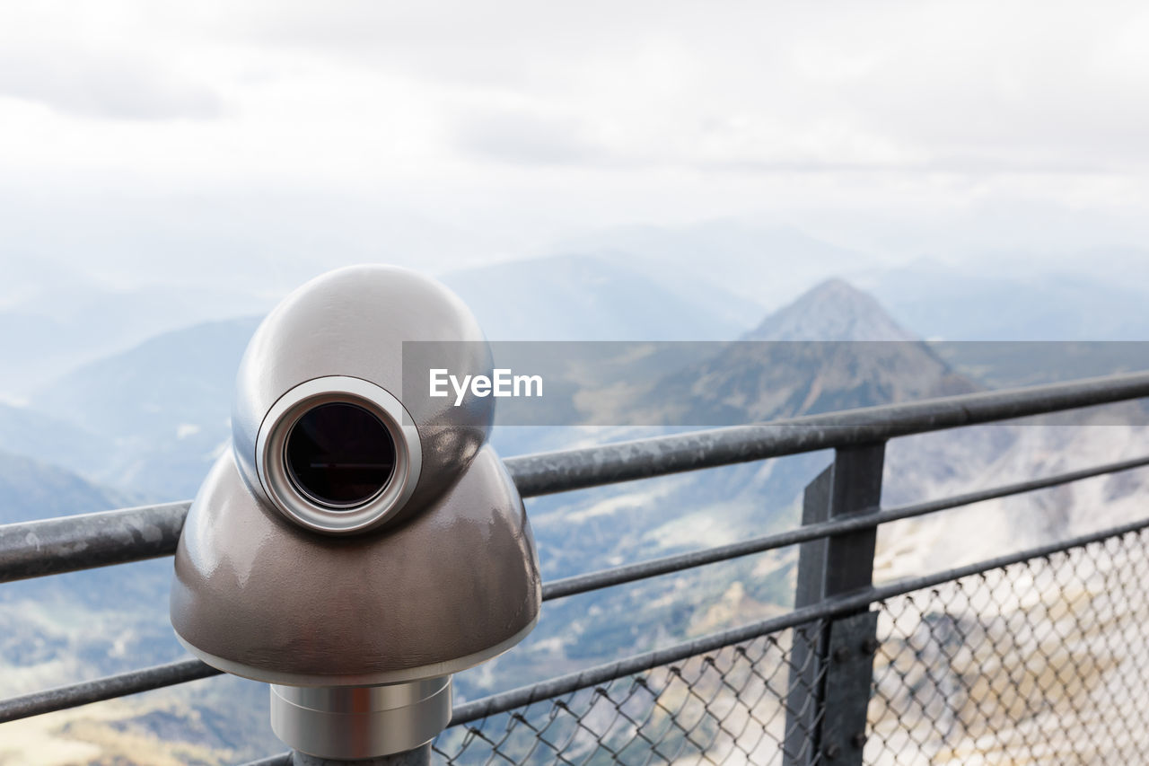 Viewing platform with coin-operated telescope in mountains