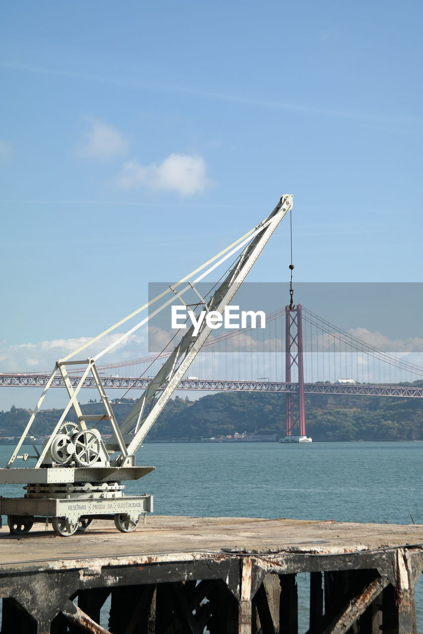 SUSPENSION BRIDGE AGAINST SKY