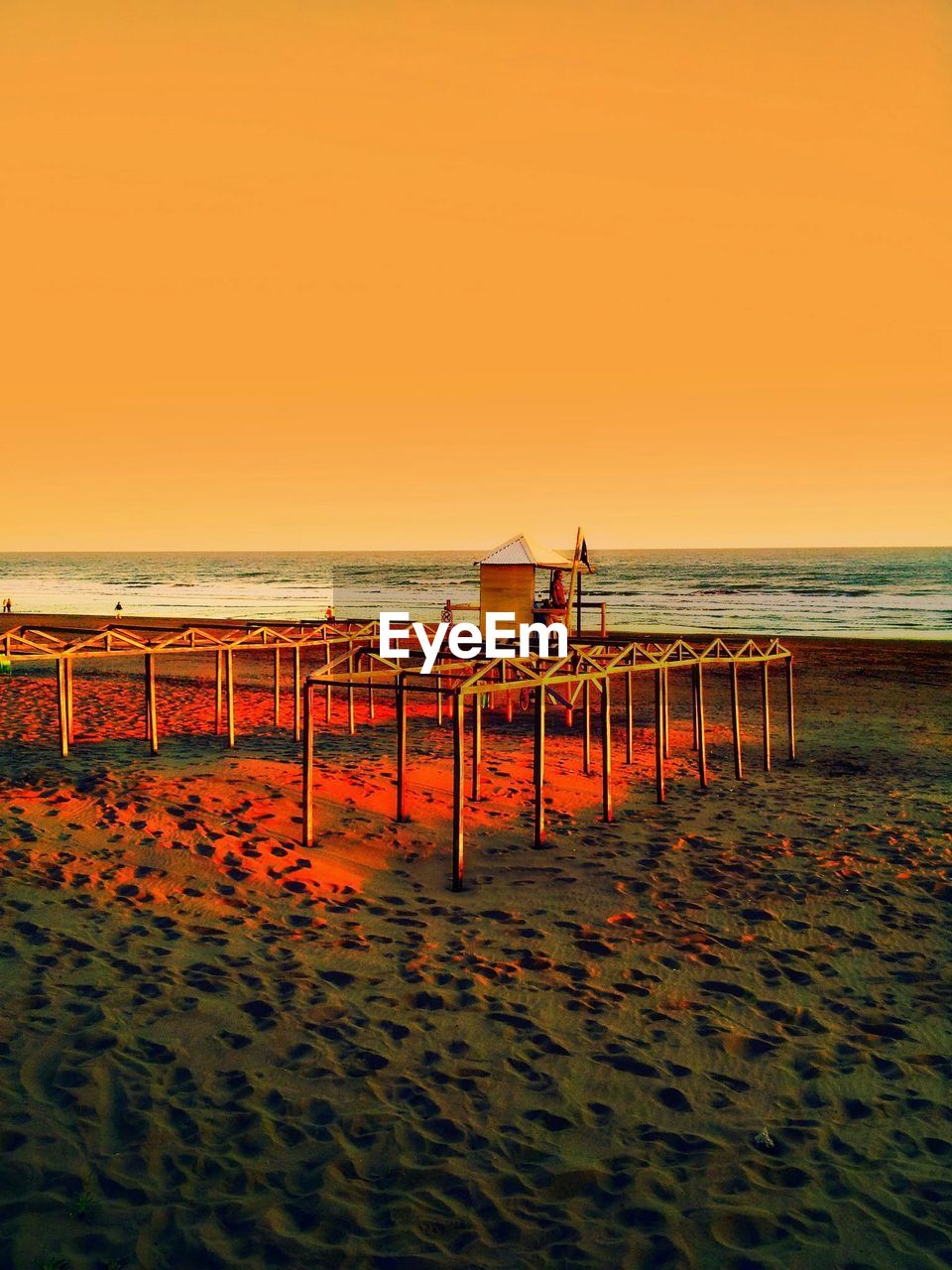 SCENIC VIEW OF BEACH AGAINST CLEAR SKY