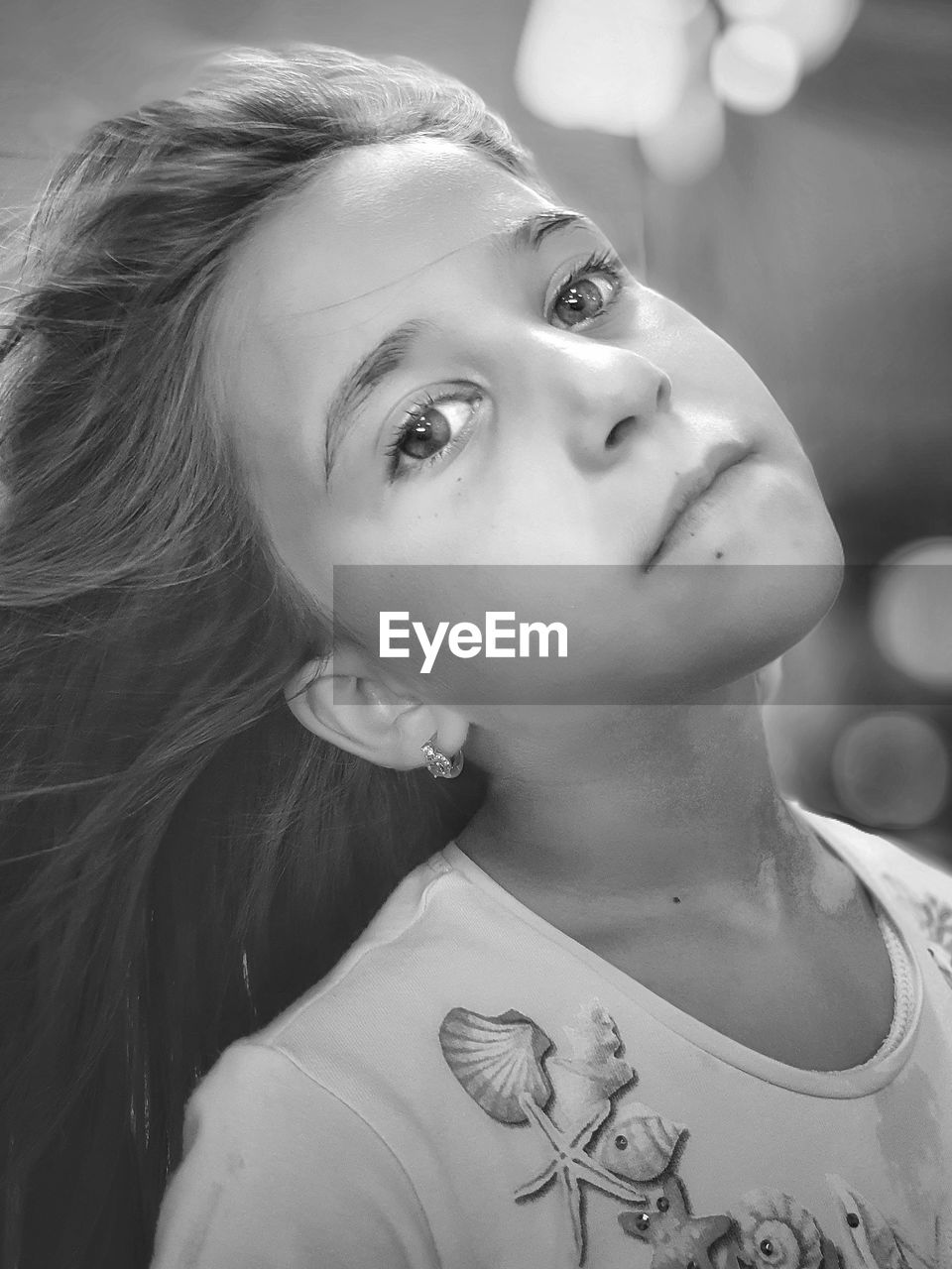 CLOSE-UP PORTRAIT OF A YOUNG WOMAN WITH EYES CLOSED