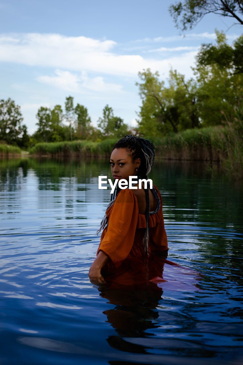 A photoshoot of girl in the water