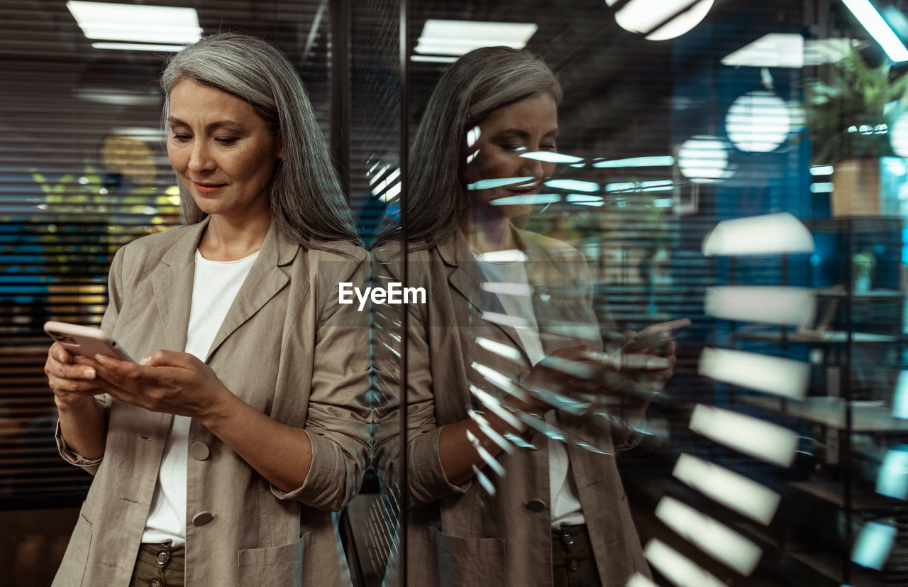 Young woman using mobile phone