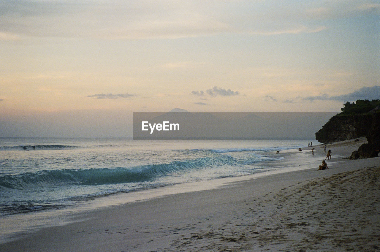 Scenic view of beach life in uluwatu, bali, indonesia. shot on 35mm kodak portra 800 film.