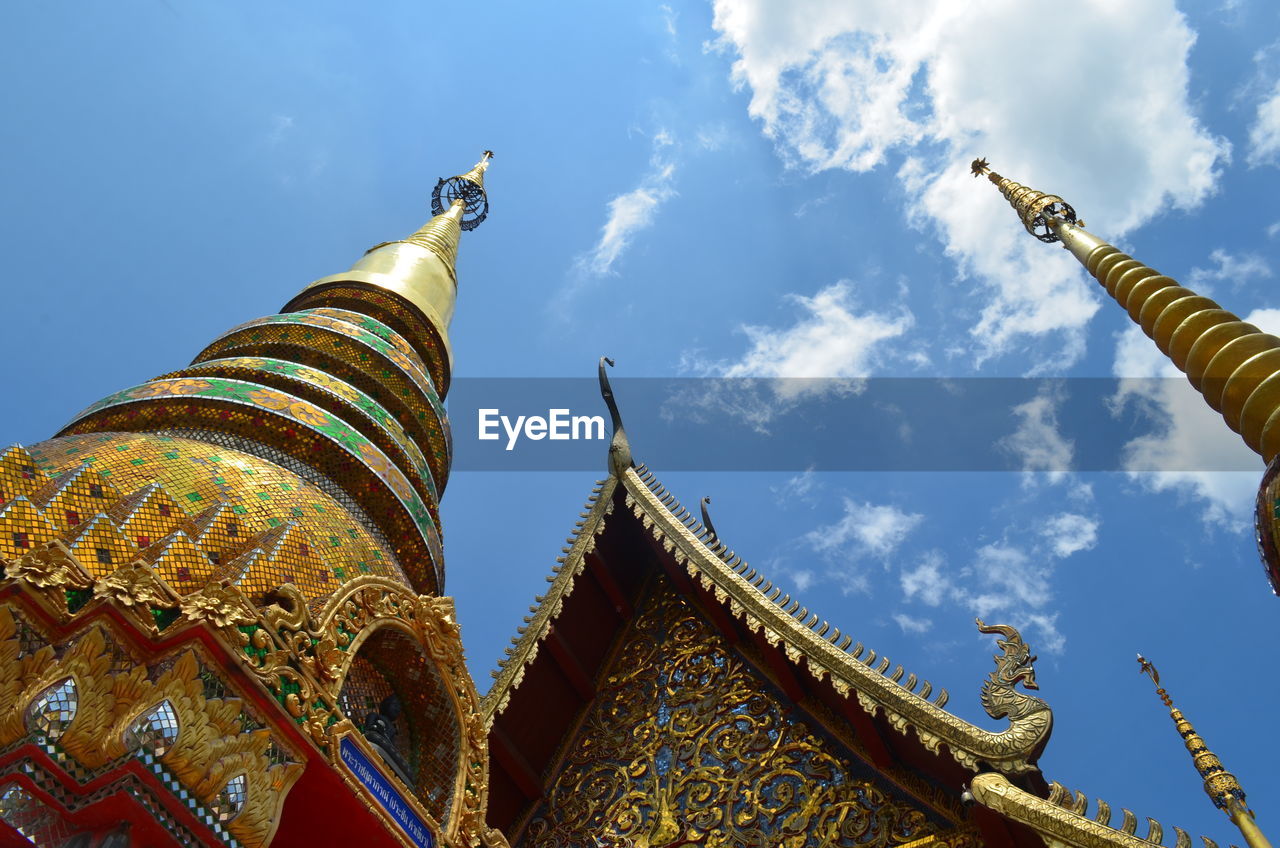 Low angle view of temple against building