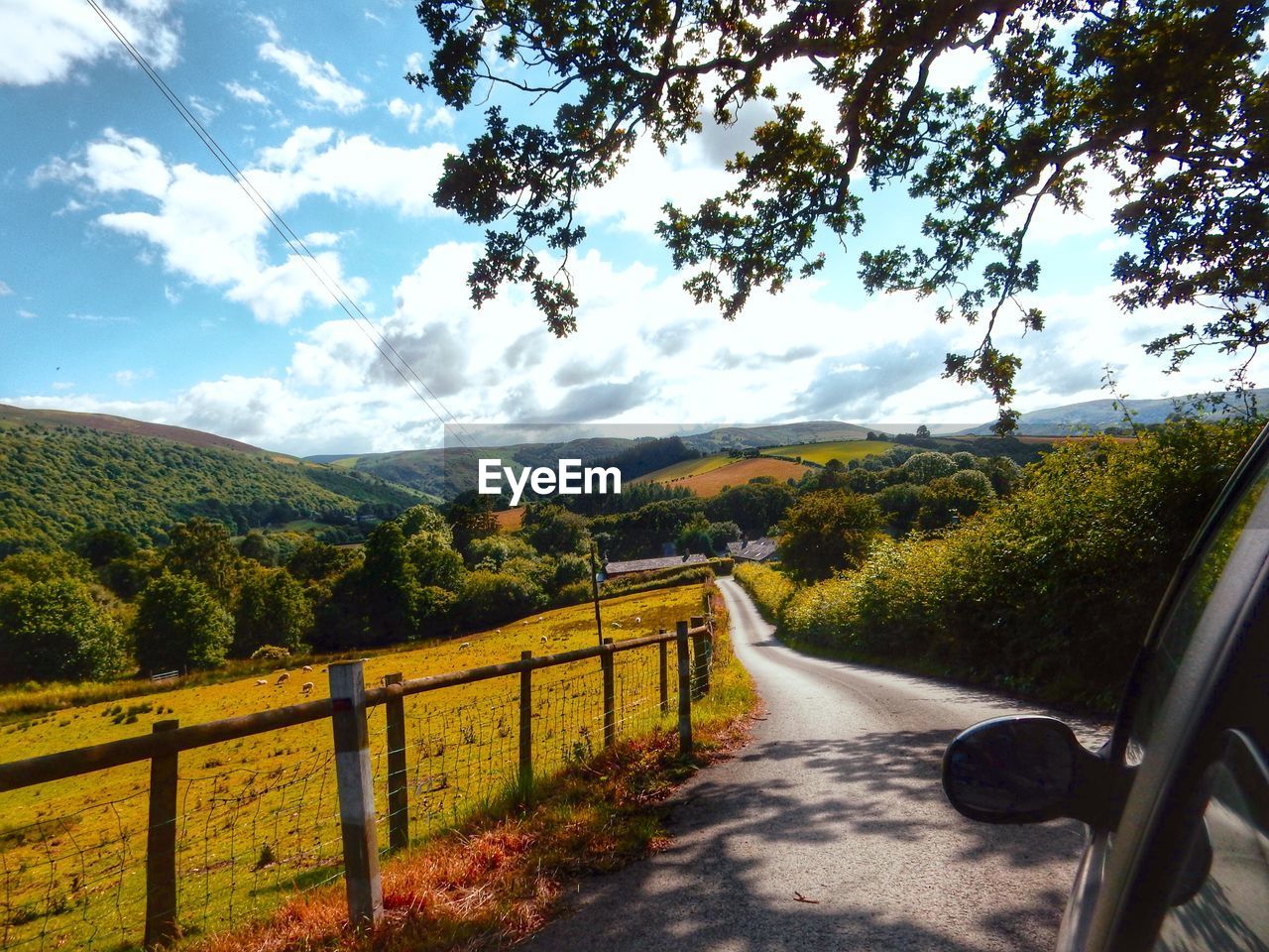 ROAD PASSING THROUGH LANDSCAPE