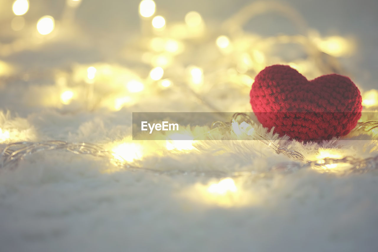 CLOSE-UP OF CHRISTMAS HEART SHAPE DECORATION