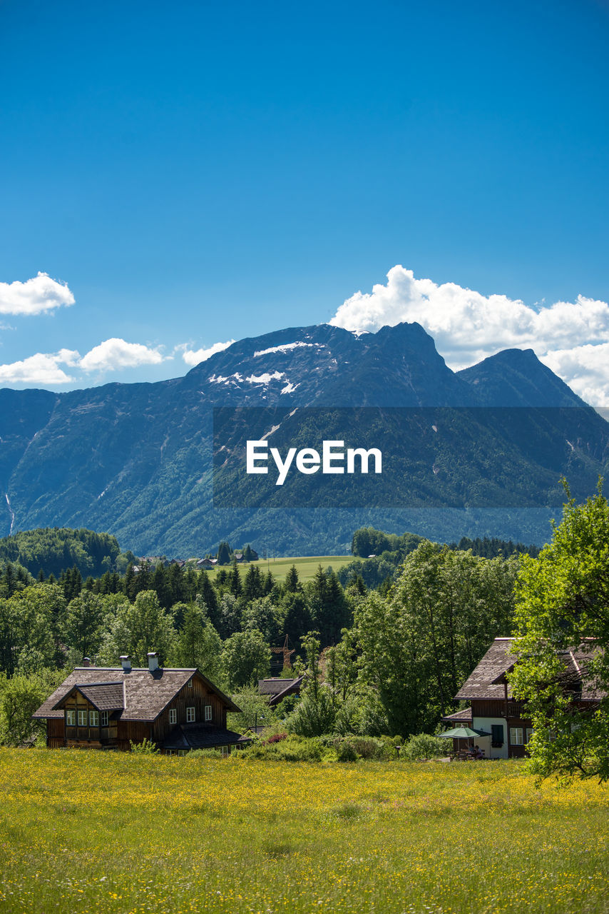 Scenic view of landscape and mountains against sky