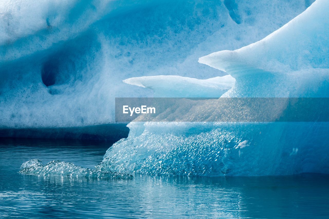 AERIAL VIEW OF FROZEN SEA AGAINST SKY