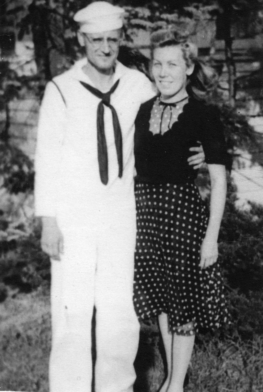 FULL LENGTH OF WOMAN STANDING OUTDOORS