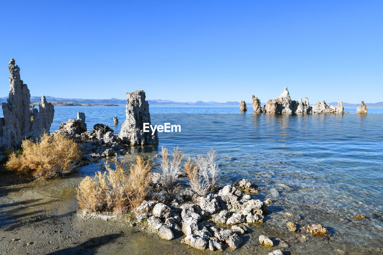 PANORAMIC VIEW OF SEA AGAINST CLEAR SKY