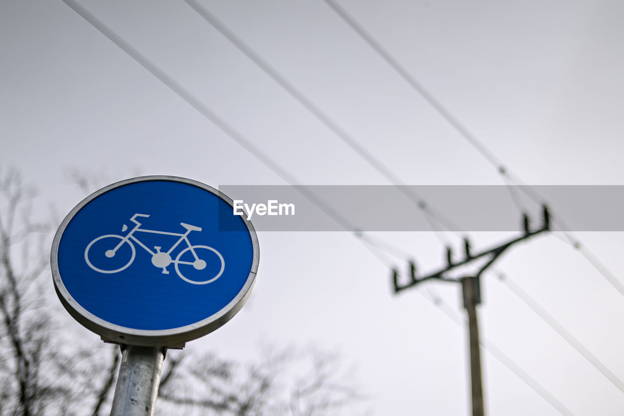 low angle view of road sign