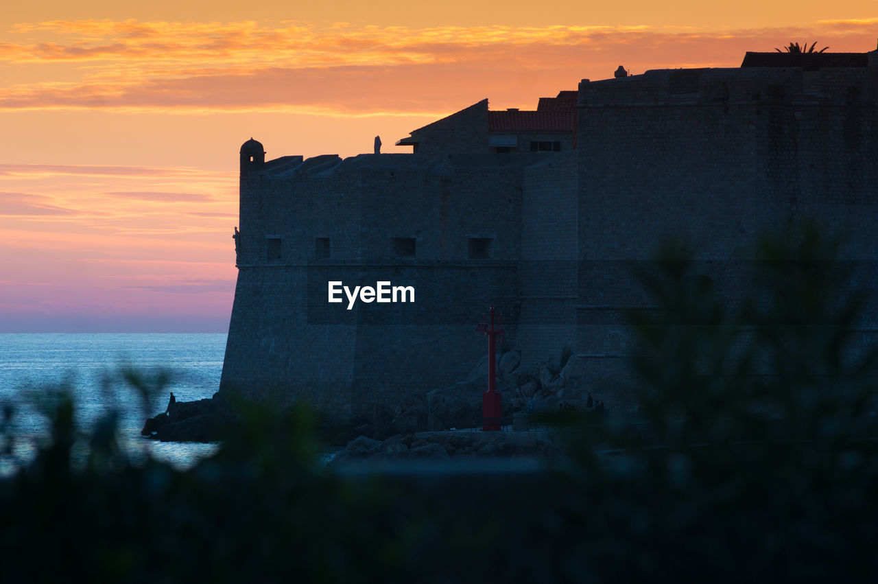 VIEW OF FORT AT SUNSET