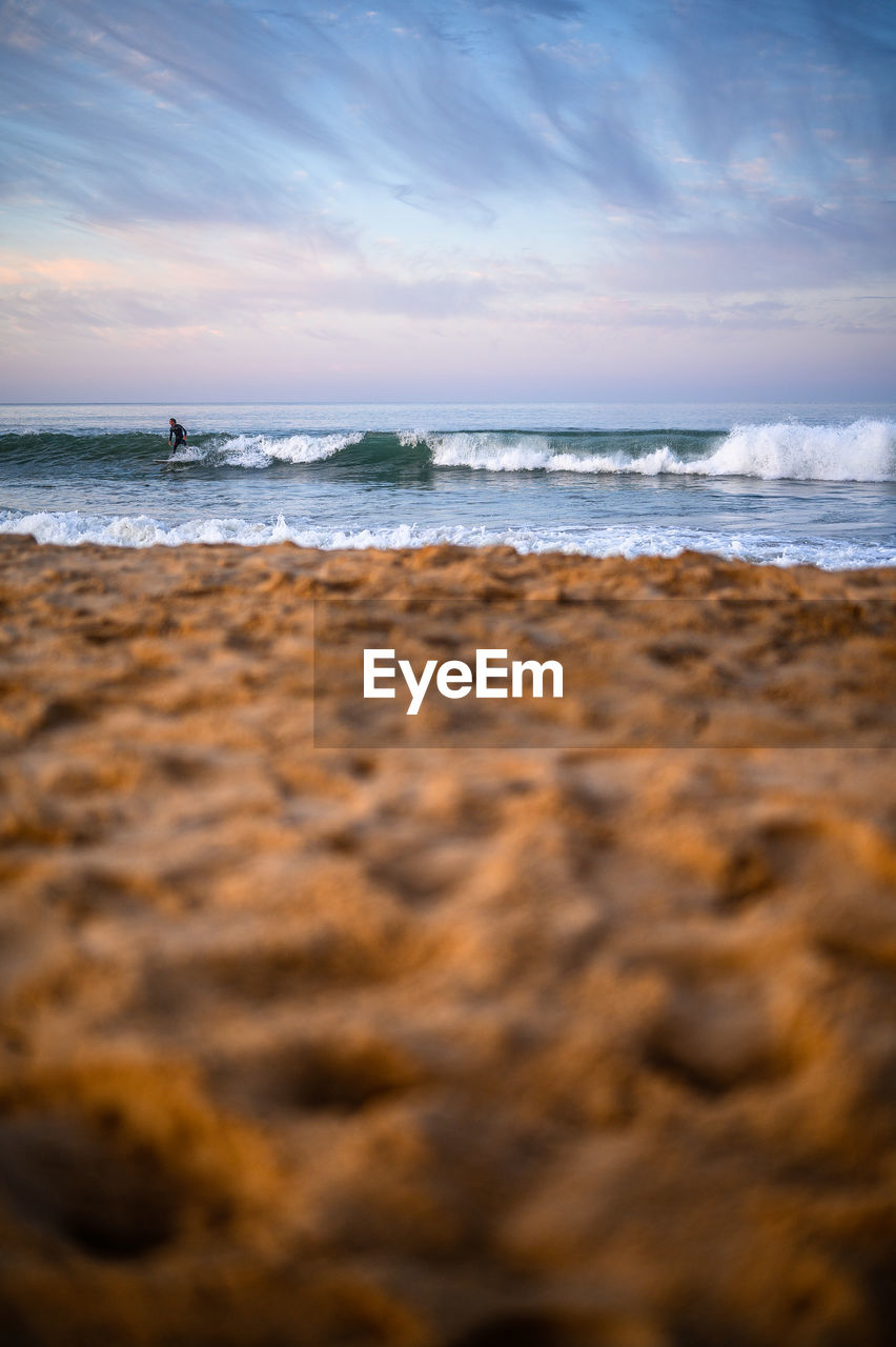 Scenic view of beach against sky