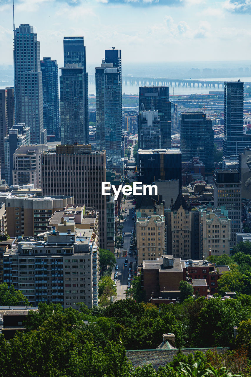 Modern buildings in city against sky