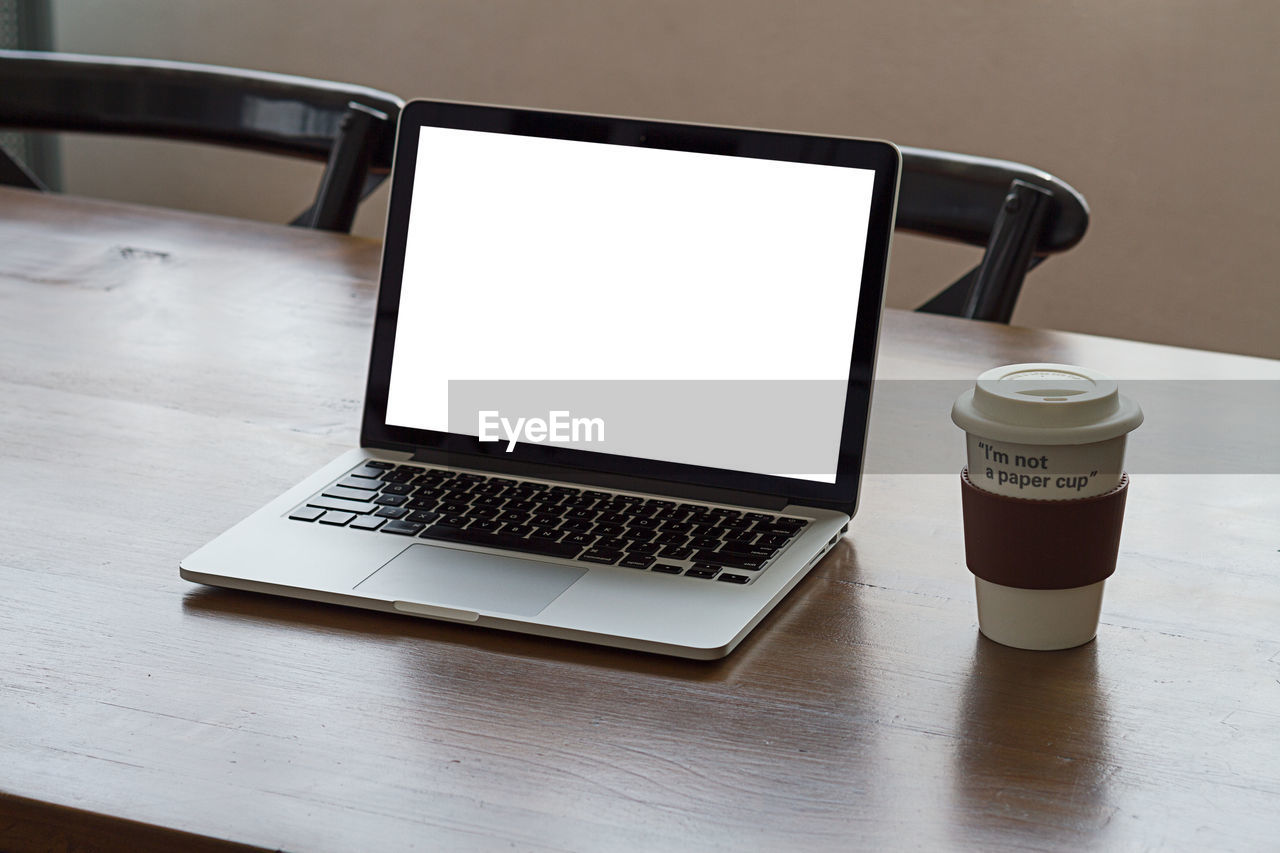 Close-up of laptop on table