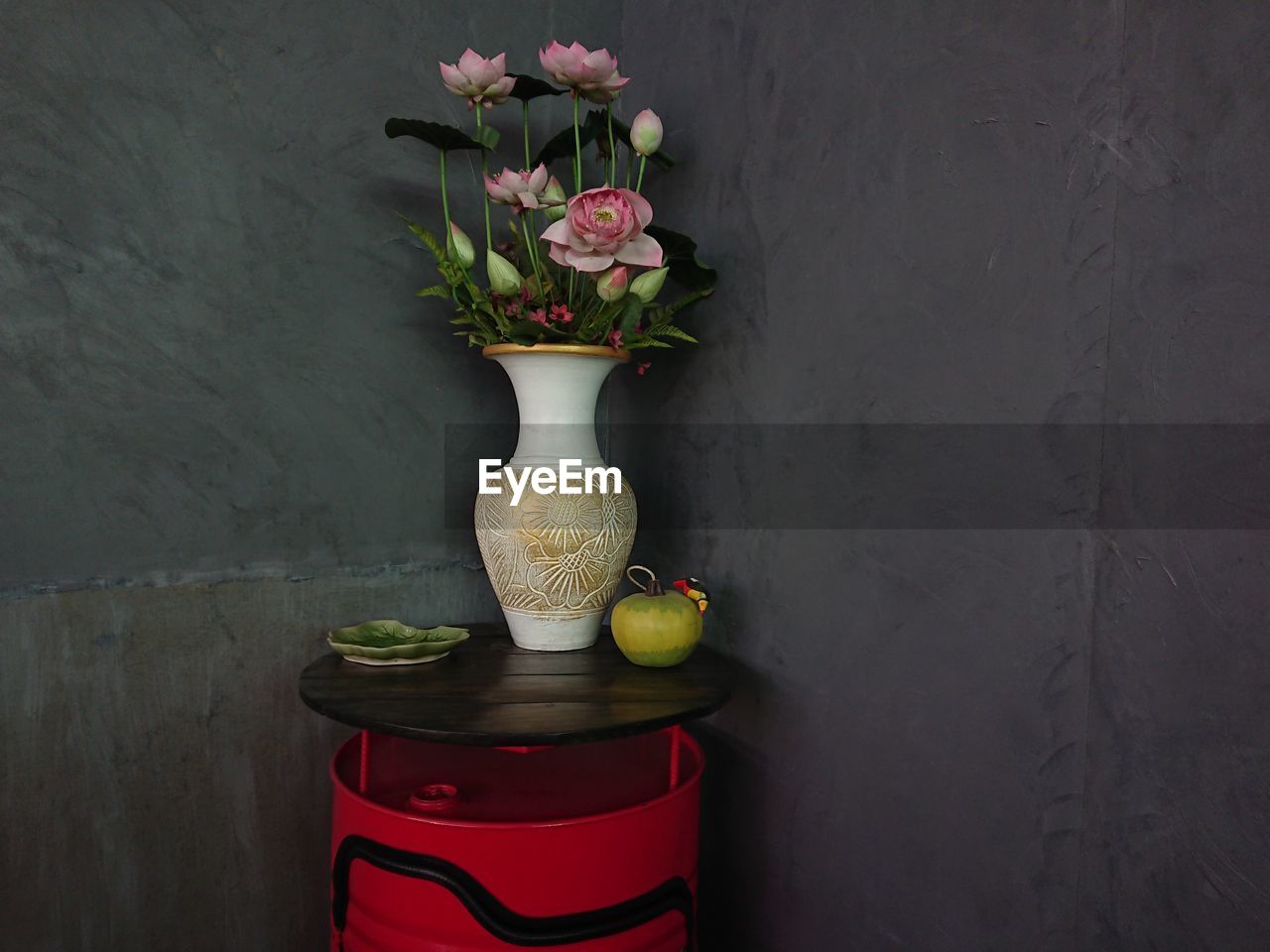 CLOSE-UP OF POTTED PLANTS ON TABLE