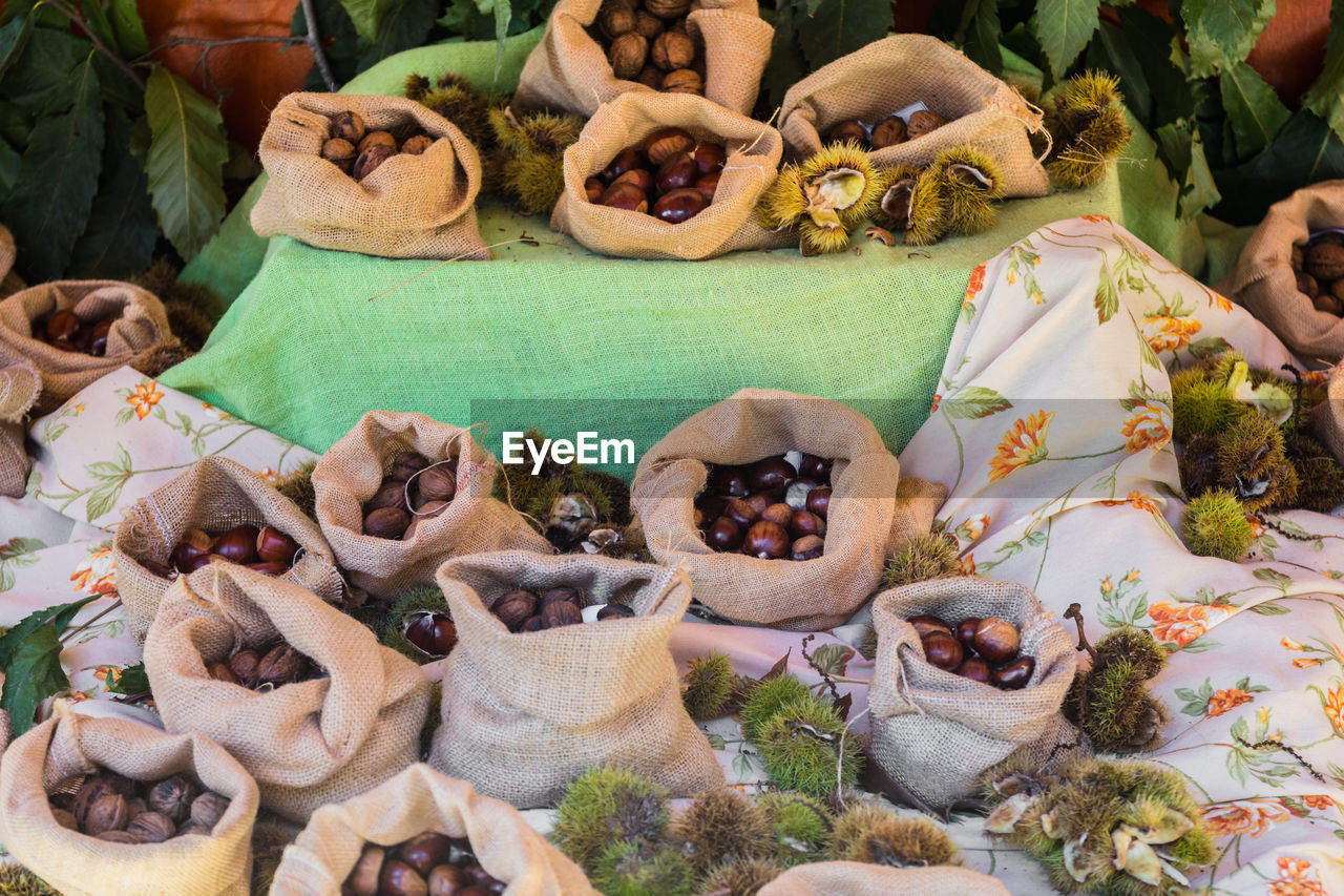 HIGH ANGLE VIEW OF PUMPKINS FOR SALE