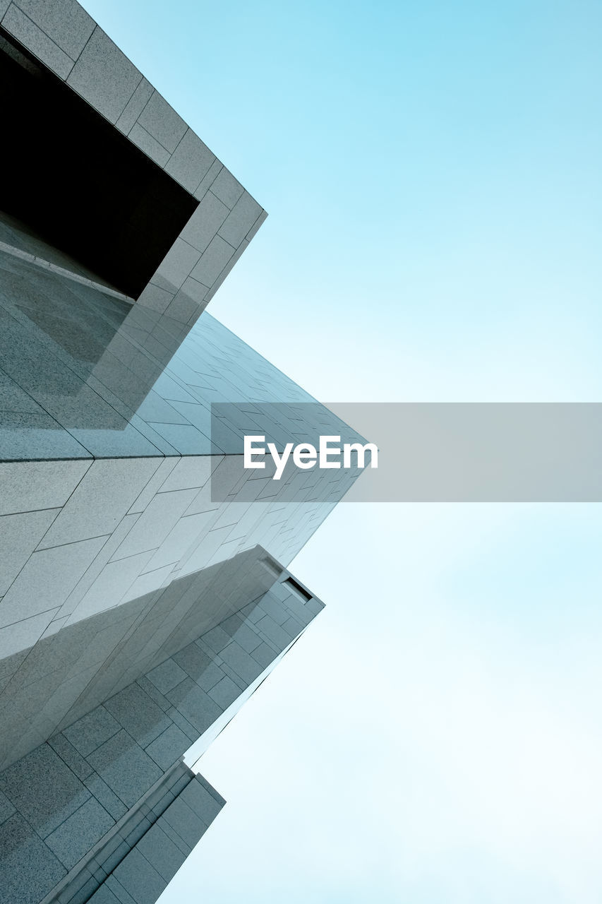 LOW ANGLE VIEW OF BUILDINGS AGAINST CLEAR SKY