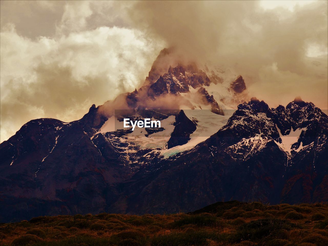 Scenic view of volcanic mountain against sky