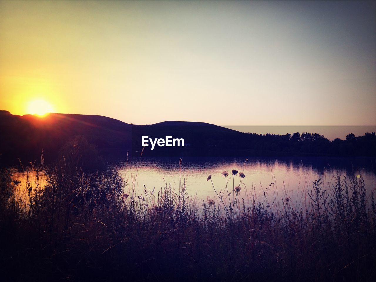 Reflections in lake at sunset