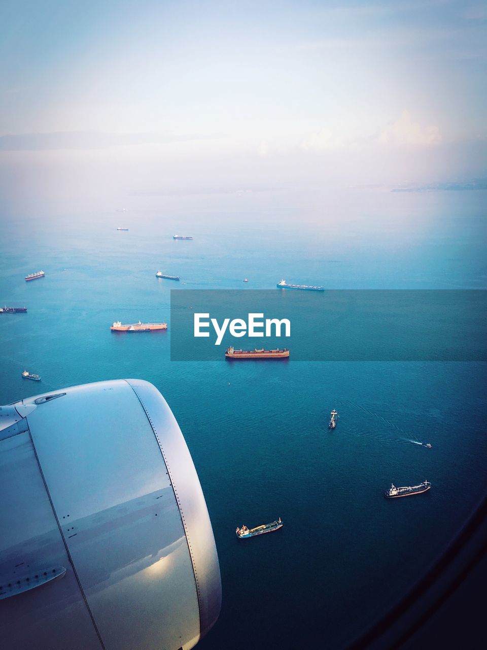 High angle view of airplane on sea against sky