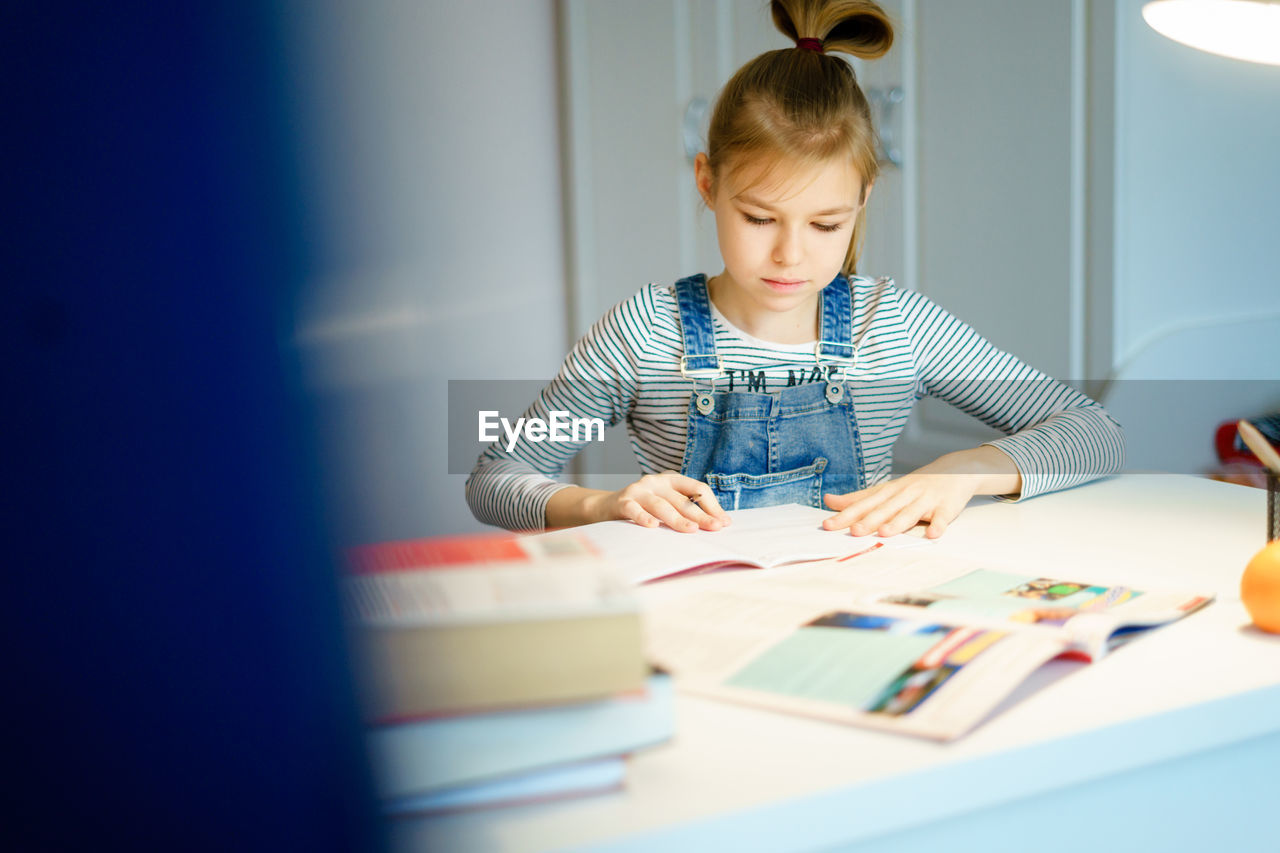 Girl studying at home