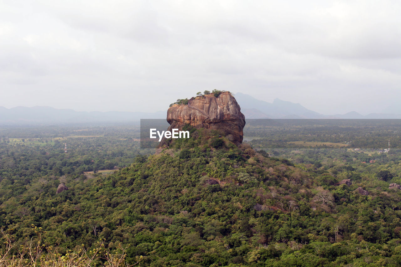 SCENIC VIEW OF ROCK FORMATION AGAINST SKY