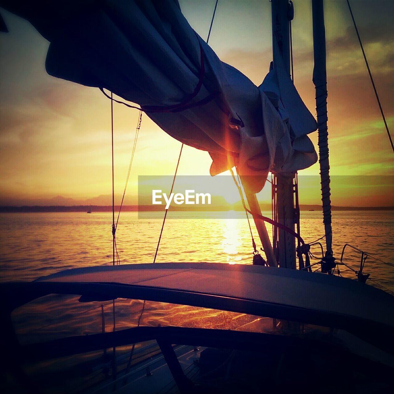 Sailing boat at sunset