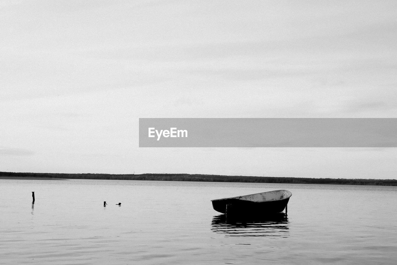 NAUTICAL VESSEL ON SEA AGAINST SKY