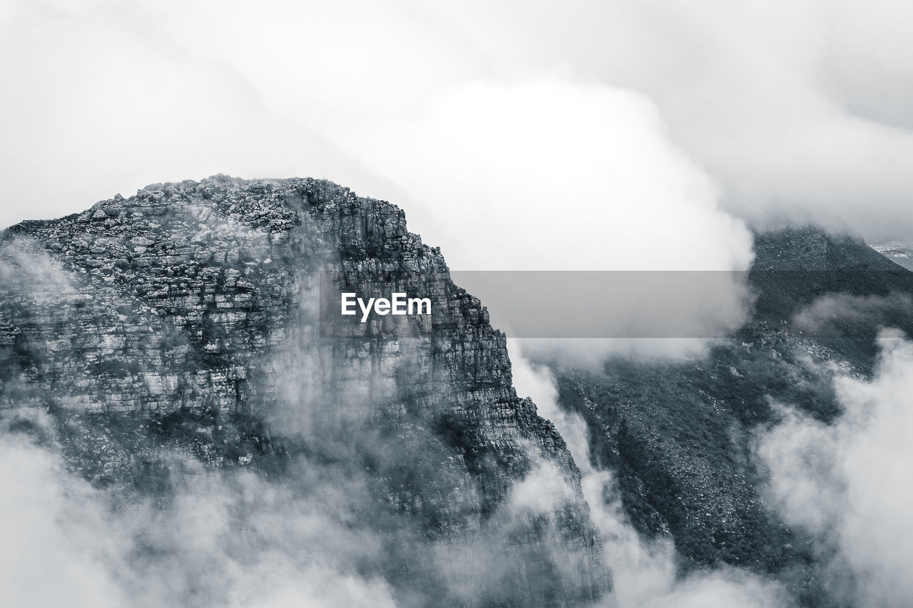 Scenic view of mountain during foggy weather