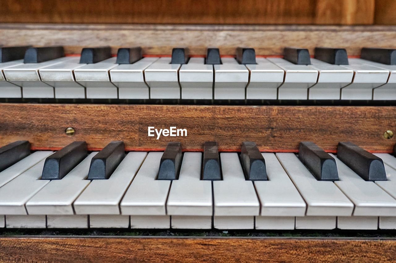 Close-up of pipe organ keys