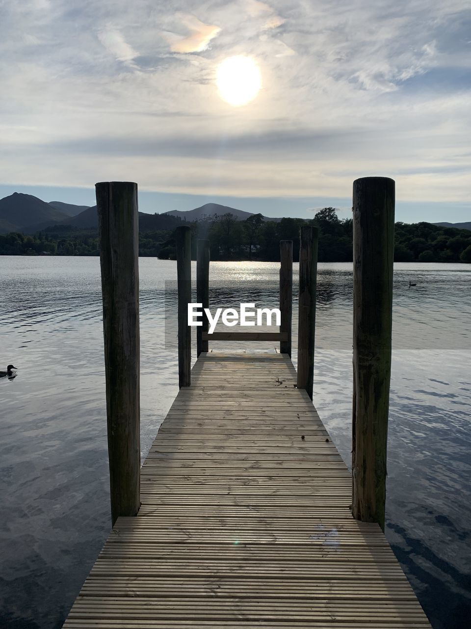 WOODEN JETTY ON PIER OVER SEA