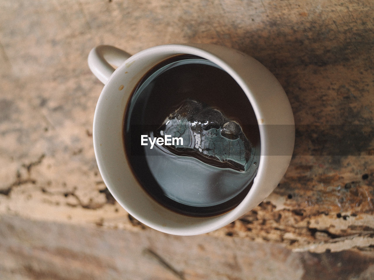 High angle view of coffee cup on table