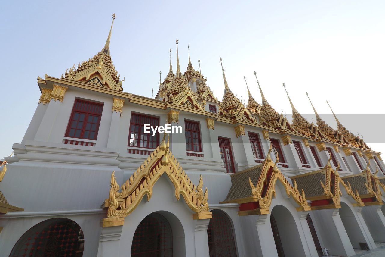 Low angle view of traditional building against clear sky