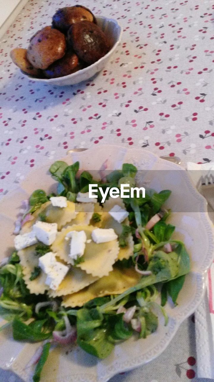 CLOSE-UP OF SERVED FOOD IN PLATE