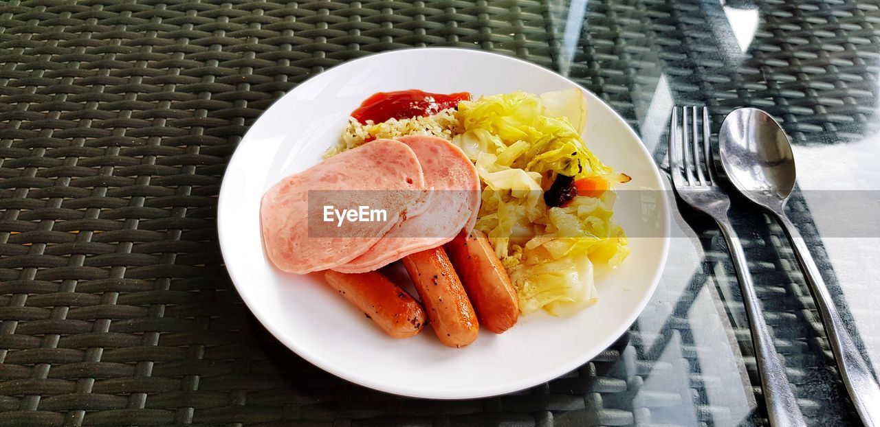 High angle view of breakfast in plate on table