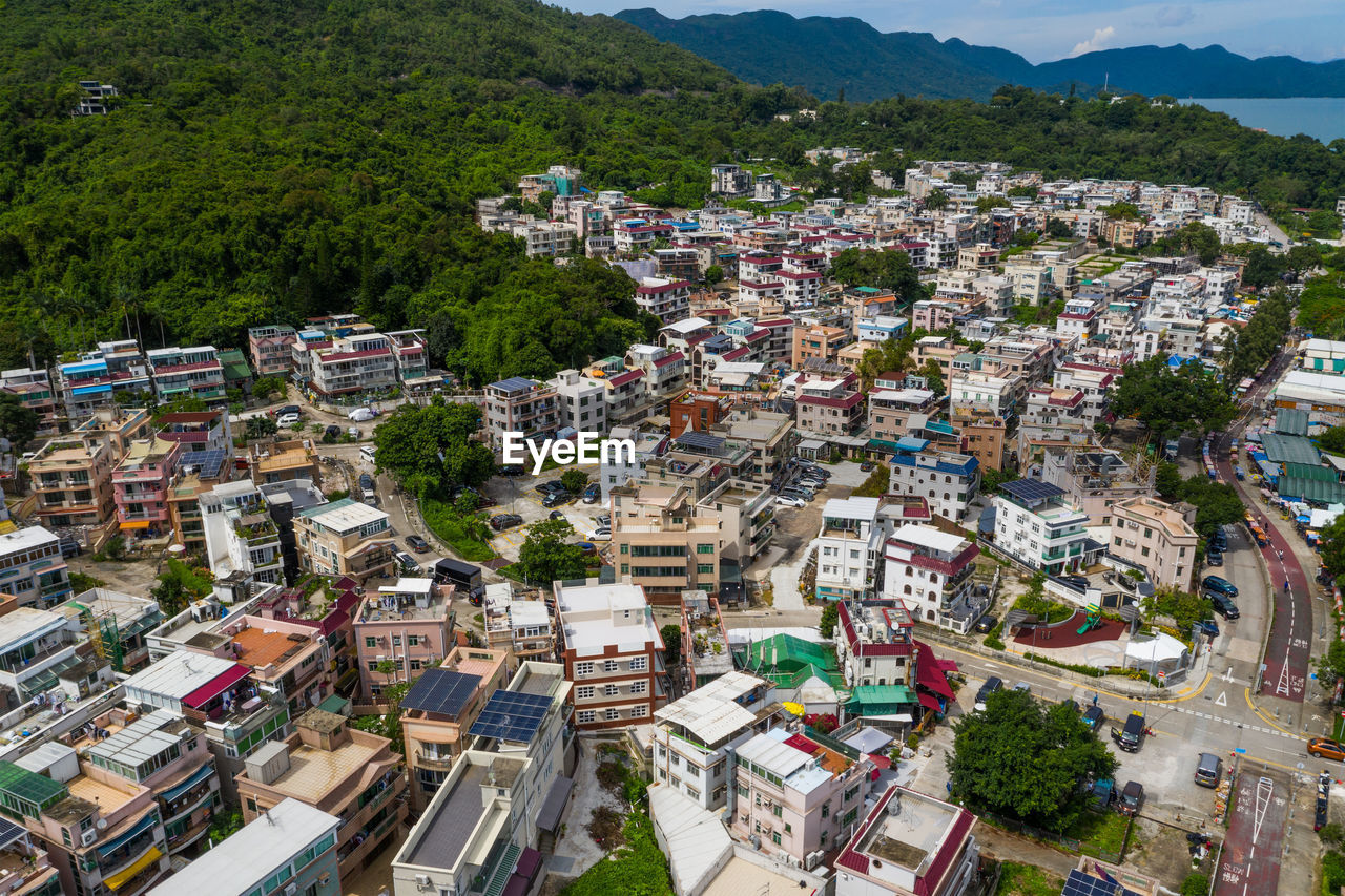 HIGH ANGLE VIEW OF BUILDINGS IN CITY