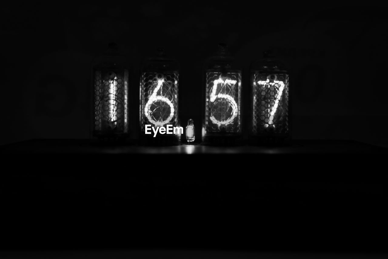 Illuminated numbers in darkroom