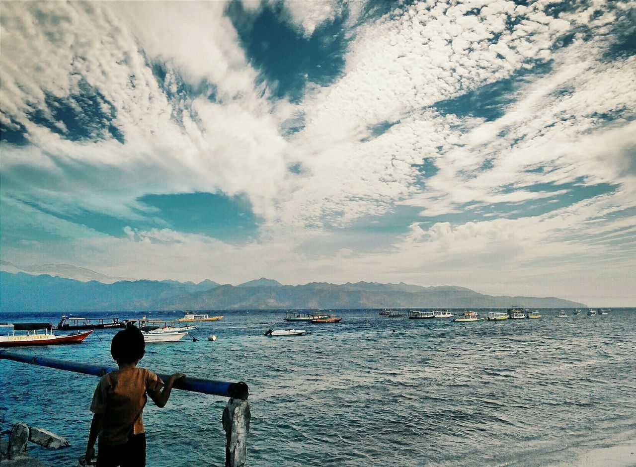 Boy looking at sea