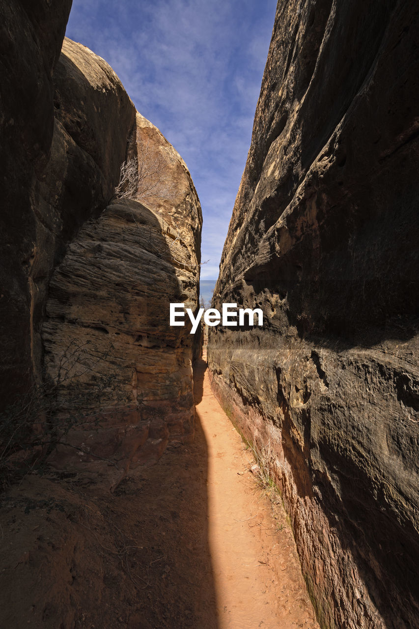 Narrow canyon trail in the desert of canyonlands national park in utah