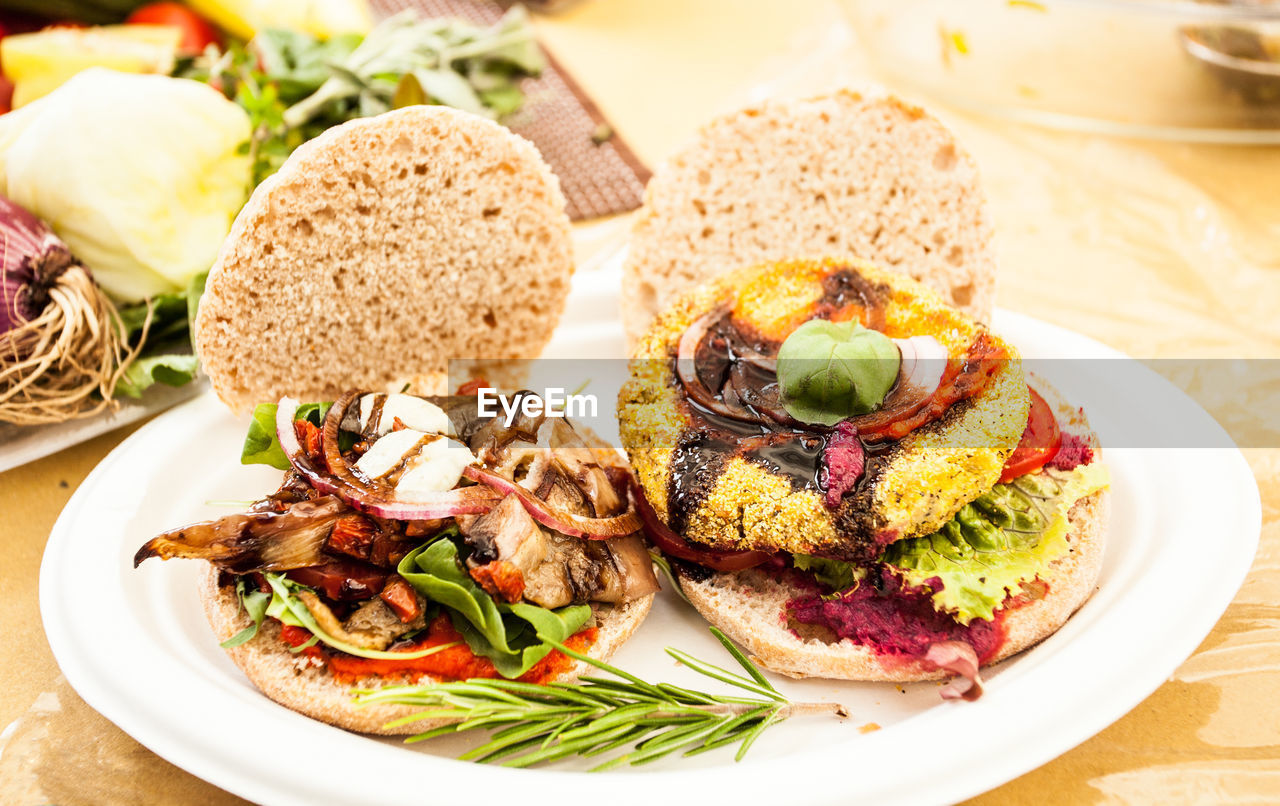 High angle view of hamburgers served in plate on table