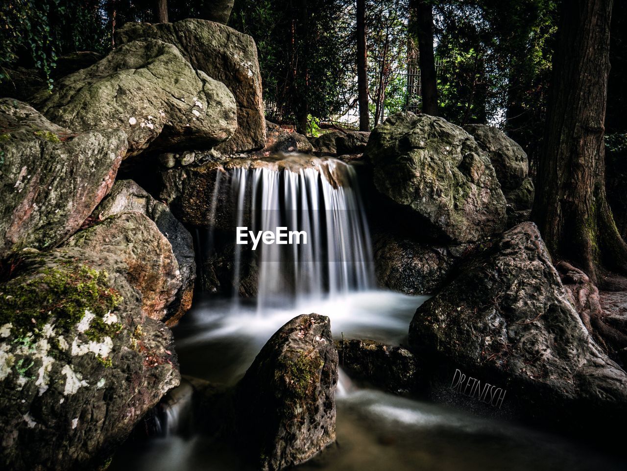 SCENIC VIEW OF WATERFALL