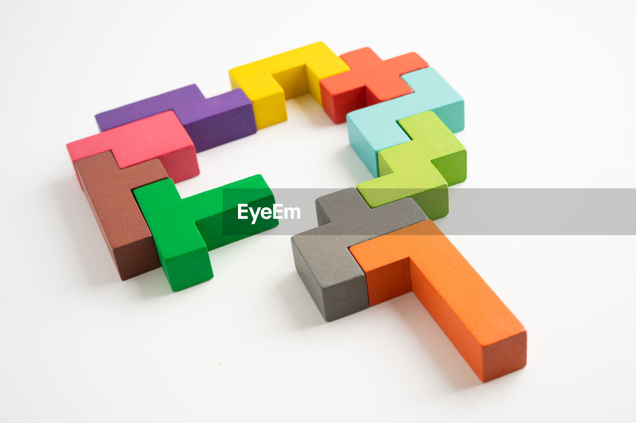 high angle view of toy blocks against white background